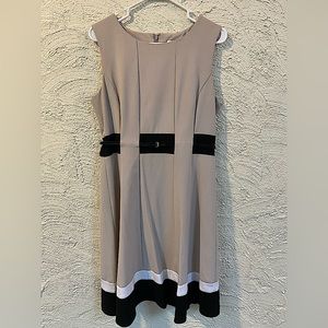 Calvin Klein size 10 dress. Tan, white and black, fitted belt and flare!